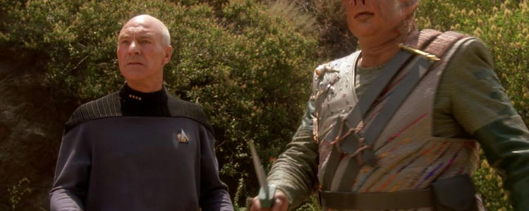 Picard and Dathon uniting against a common foe in the Star Trek TNG Episode: Darmok. Copyright CBS Corporation